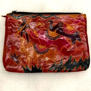 Multi colored clutch. Genuine leather red black yellow.